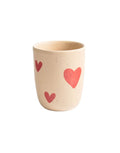 Handgemachte rosa Tasse mit Herzmotiv aus Steinzeug von Egg Back Home, 220 ml, mit individueller Glasur – spülmaschinenfest und mikrowellengeeignet.