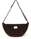 Schokoladenbraunes Fanny Pack Chocolate Teddy von Studio Noos aus weichem Teddy-Material mit Reißverschluss und verstellbarem Riemen.
