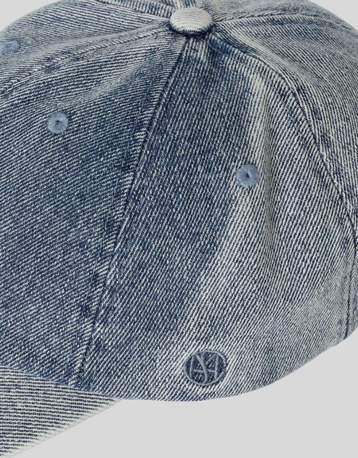 MSCH Copenhagen Cap Buffy Mid Blue Wash aus Denim mit gebogenem Schirm und verstellbarem Verschluss.
