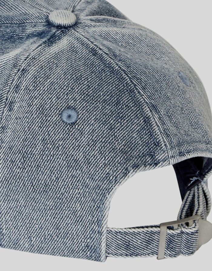 MSCH Copenhagen Cap Buffy Mid Blue Wash aus Denim mit gebogenem Schirm und verstellbarem Verschluss.