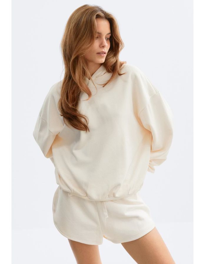 Off-White Hoodie von Gina Tricot mit lockerem Schnitt und Textprint auf dem Rücken.
