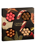 Small Winter Selection Box von Lakrids by Bülow mit vier ausgewählten Lakritzsorten Classic Caramel, Crispy Raspberry, Double Chocolate und Cherry Sour.


