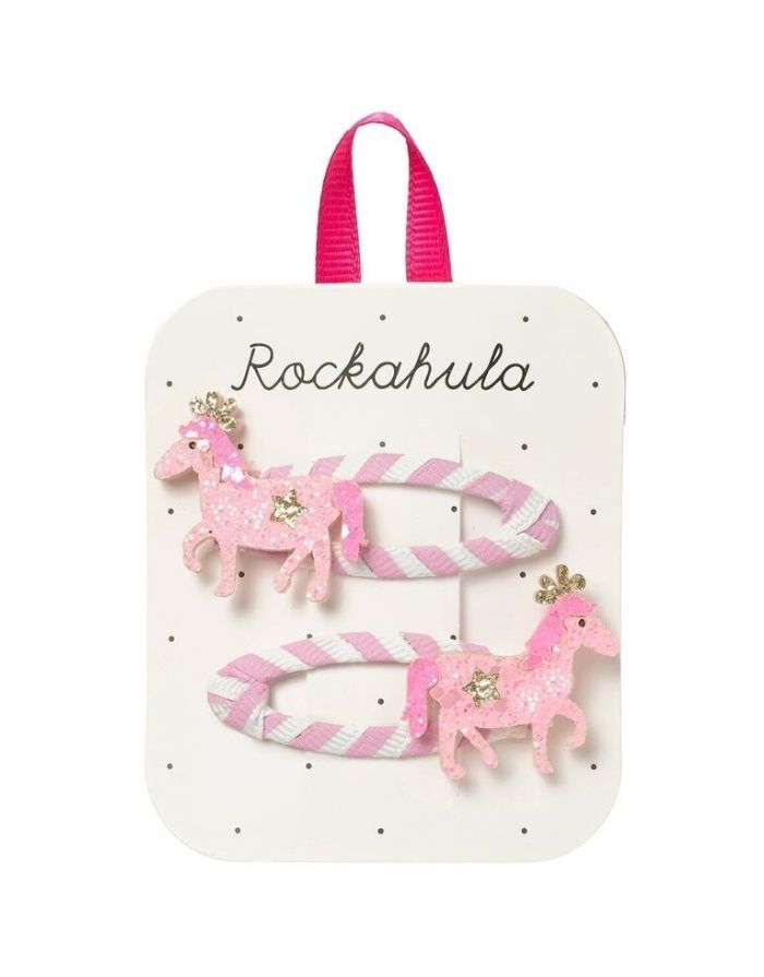 Zwei Pink Pony Haarspangen von Rockahula mit glitzernden Ponys, goldenen Kronen und gestreiften Klickspangen.