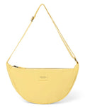  Studio Noos Fanny Pack Textured Puffy Butter Yellow mit gepolsterter Struktur und verstellbarem Gurt.
