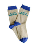 Bunte Einschulungssocken von Tiny Day mit Schriftzug „Ciao Kakao“ in Beige, Grün und Blau.