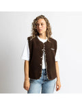Teddy Fleece Weste Chocolate von VIVI MARI, kuscheliges Fleece, Loose-Fit, mit Druckknopfleiste und zwei Paspeltaschen, nachhaltig aus recyceltem Polyester
