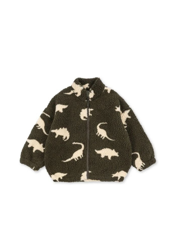 Teddyjacke Jody Dino Silhouette mit weißen Dinosauriern von Konges Sløjd als Freisteller von vorne