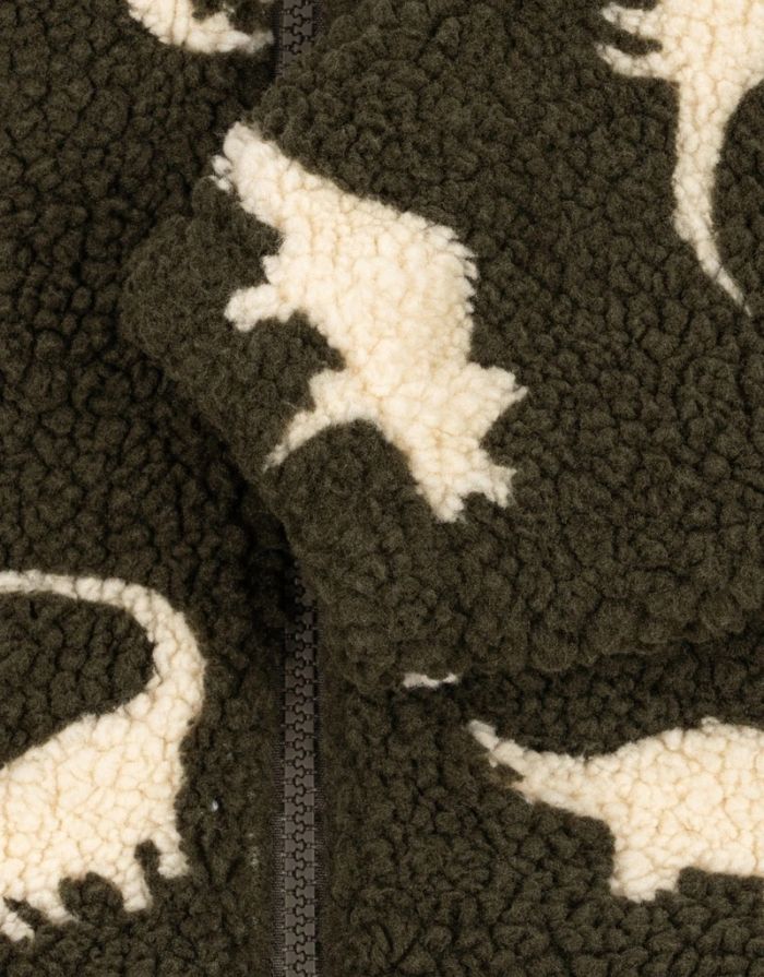 Teddyjacke Jody Dino Silhouette mit weißen Dinosauriern von Konges Sløjd Ärmel im Detail