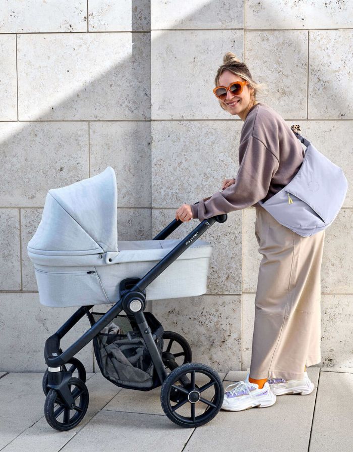 LÄSSIG Lunua Wickeltasche in Lilac – große Bum Bag mit Wickelzubehör, vegan, recycelt & pfc-frei, mit Neon-Details und Kinderwagenhaken.