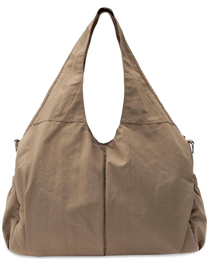  Jollein Urban Wickeltasche in der Farbe Earthy mit wasserabweisender Oberfläche und praktischen Fächern.