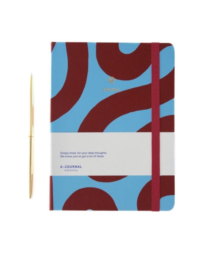 Notizbuch in Braun Blau von a Journal von vorne mit goldenem Stift daneben