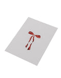 Postkarte Bow von Eulenschnitt mit roter Aquarellschleife auf matt lackiertem 400g Papier im DIN-A6-Format – ideal als Weihnachtskarte oder Geschenkanhänger.